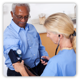 Picture of a man having his blood pressure checked