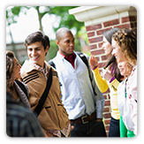 Group of young adults talking outdoors