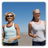 Photo of two women running outside